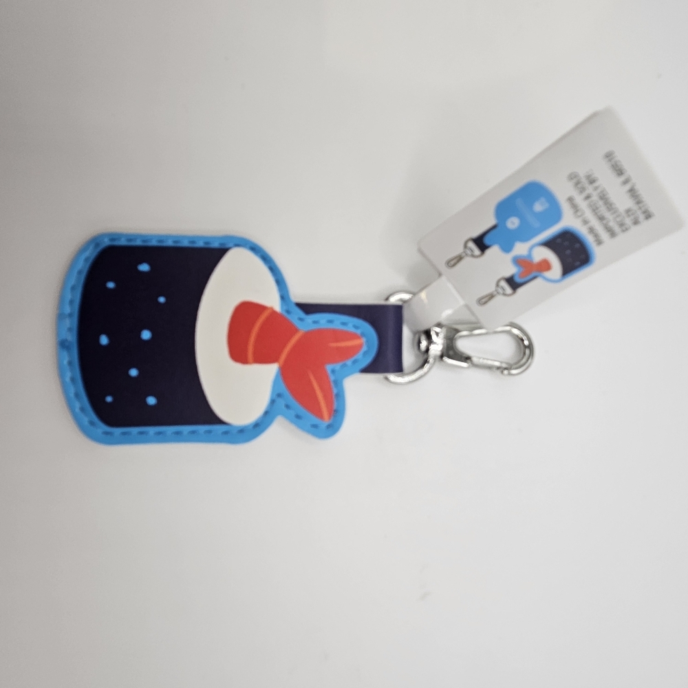 Aldi Sushi Quarter Keychain with Blue and Red Accents